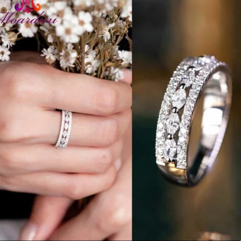 Sterling Silver and White Zircon Ring.